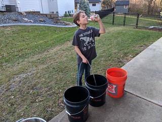 Homebrew - We gave Elias a job - fill buckets from the wort chiller