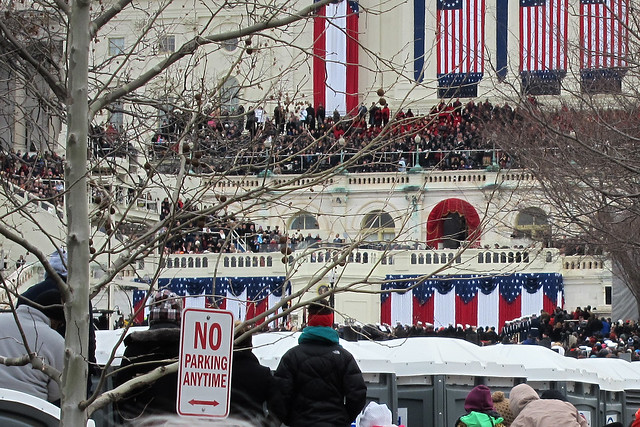 The president (that tiny man above the dude with the turquoise hoodie) speaks to us