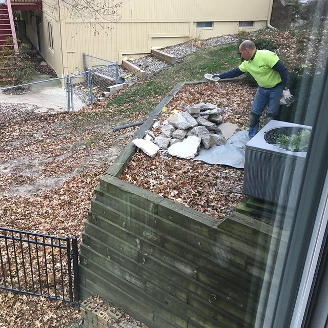 Takin concrete out the side of the house