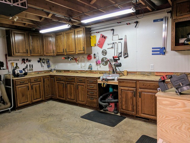 Cabinets, benchtops, and pegboard