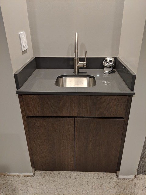 Got the cabinet doors, sink hardware and electrical stuff updated