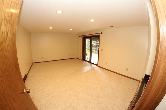 I somehow need to figure out how to fit a bar, theater, and foosball table into this rec room