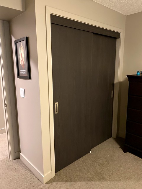 Guest bedroom closet doors finished off