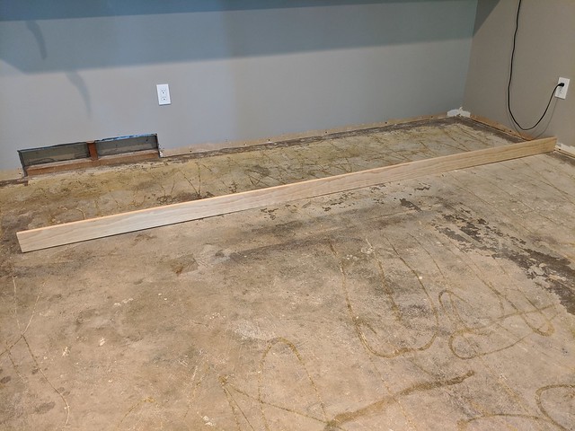 Our rec room had a very non-flat subfloor... which wouldn't quite work with the floating wood floor we had planned.