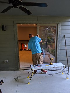 I hired one of my neighbors to put in the sliding door. They did a great job