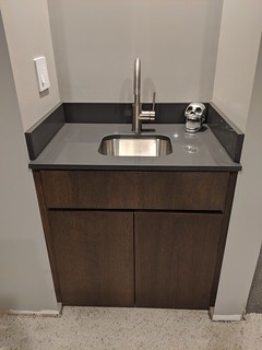 Got the cabinet doors, sink hardware and electrical stuff updated