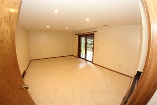 I somehow need to figure out how to fit a bar, theater, and foosball table into this rec room