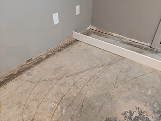 Broken corner in the rec room subfloor