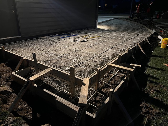Forms set for a larger driveway and a step down to the back yard