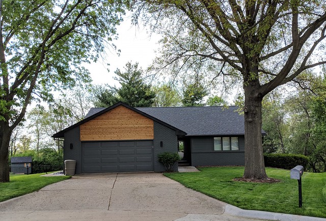 The before photo. The driveway was super narrow, really buckled, and didn't flow well to the front door.