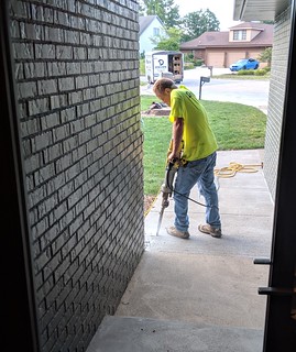 Knockin out that old sidewalk