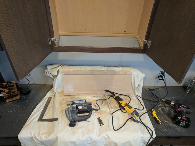 Time to install this hood. PS - the DeWalt multitool is my new favorite power tool.