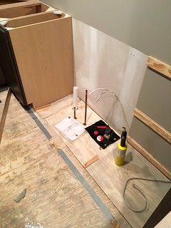 Takin apart the new cabinets. Fixing a couple more cases of "that's not my job"