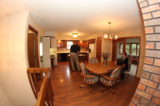 The casual dining room/kitchen will become a larger kitchen with an opened up wall to the porch/n...