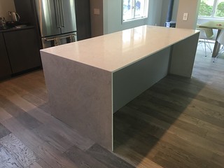 Designers call this a waterfall island. Installers call it a staple. Either way, it's p cool.