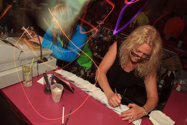 Nelly and Amber behind the bar