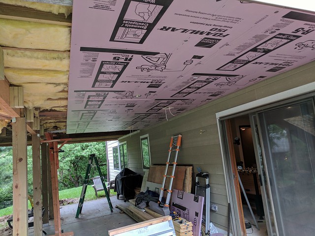 Puttin up some rigid foam board to help seal up the dining room floor.