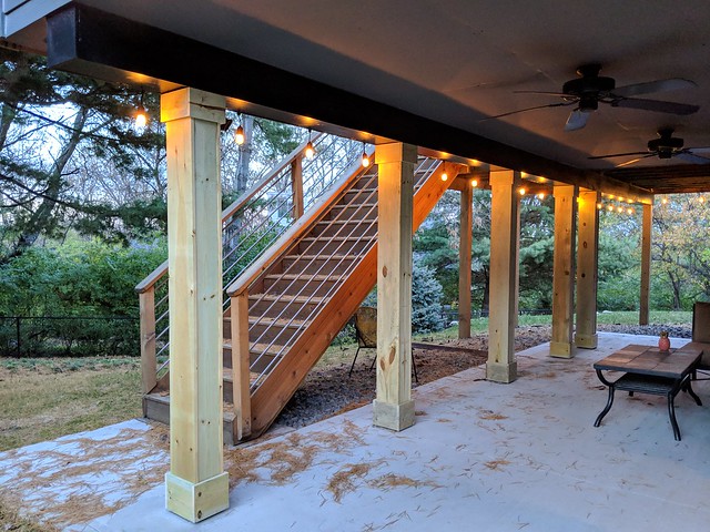 Posts mostly wrapped. Next: a floating piece of PVC trim to sit on the ground and paint