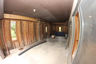 The "shed" space below the four seasons porch and deck. Notice the 3 different sets of posts to h...