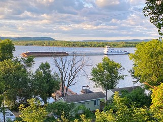 Barge - Another barge rolls past the tiny home