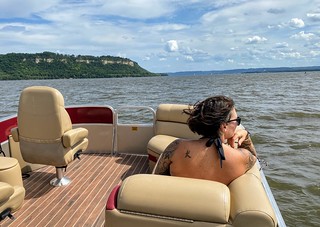 Boatin past some Wisconsin bluffs