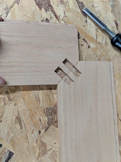 Hoping to keep hardware to a minimum, I joined the banister cap and base boards together with dow...