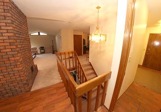 Looking toward the living room and entryway from the kitchen.