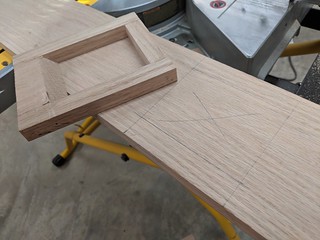 I made a jig in order to help me make a clean, square hole to inset the bottom newel post into th...