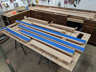 I masked the glue points of all of the wooden banister pieces before finishing