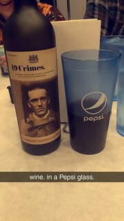 Drinks - Wine. in a Pepsi glass.
