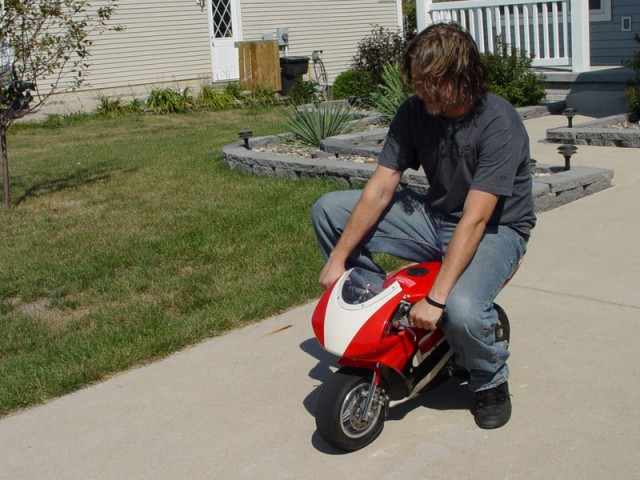 Starting the pocket bike up.