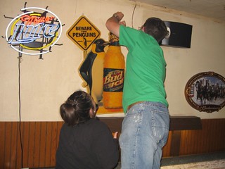 Taking the penguin sign down