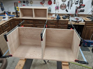 Instead of a box with a shelf and a divider inside, I made 2, full length horizontal shelves that...