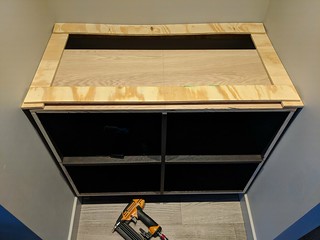 For the top, I scribed a strip of plywood for each side, tacked them together and then used that ...