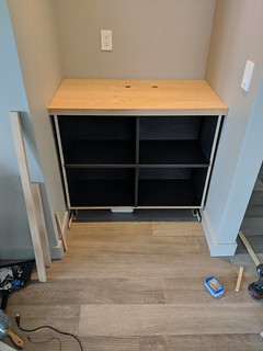 Top faced with holes drilled to conceal the wires of a Technics 1200.