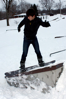 Snowboarding - Anthony with a frontside boardslide