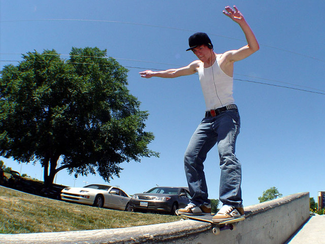 Kyle with a board slide (3 of 3)