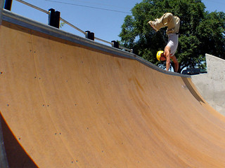 Mike Adam doing a handstand at the top of the quarter pipe