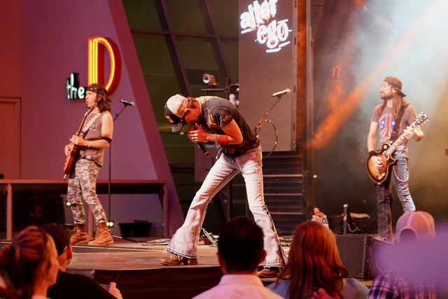 We chilled by this cover band for a while. Alter Ego. They were better than their attire.