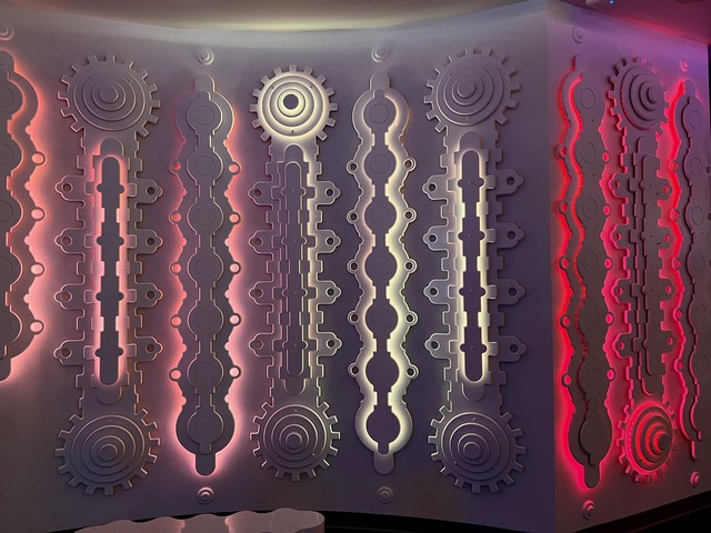 Layers of dancing light and CNC cut panels