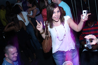 Chick dancing by the booth