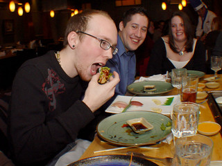 Sushi - Vic eating then end of a spider roll