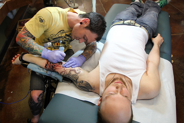 Getting tattooed by Joshua Bowers at Iron Heart Tattoo