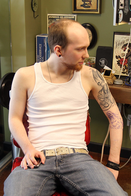 Waiting to get tattooed