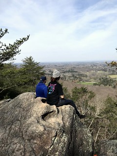 Sitting in the Indian seats.