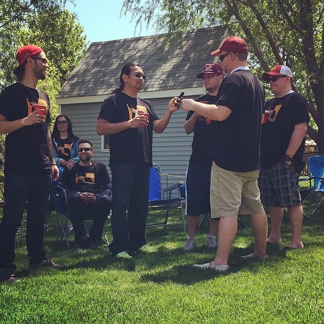 Dudes in red hats. Photo by Nicole Sutherland