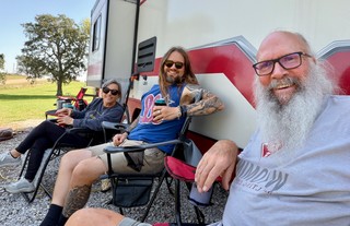 Hangin in the shade. Watchin the game. Waitin for Kari.