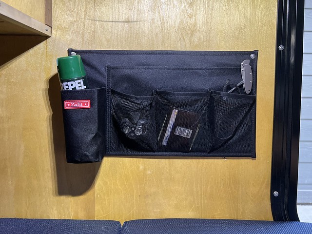 New bedside camper storage. Much more functional.