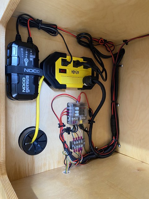 Noco genius charger installed. Wires cleaned up a bit.
