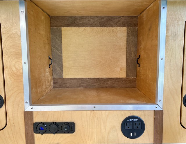 Added some footman's loops to the camper cubby so that we could strap some stuff in when needed